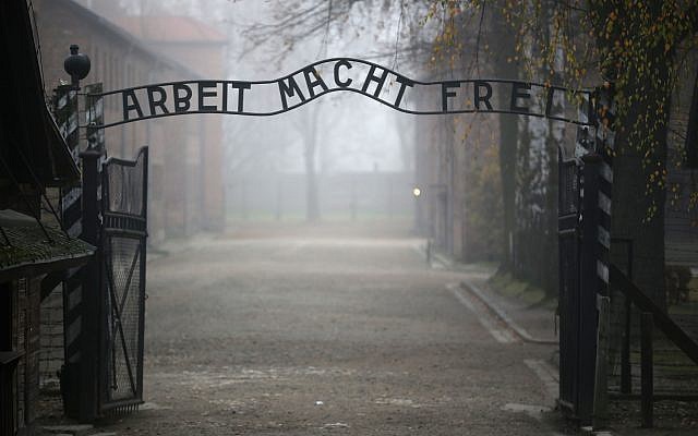The main gate of the former Auschwitz extermination camp in Oswiecim, Poland, with the infamous sign reading 'Work sets you free.' (Christopher Furlong/Getty Images/via JTA) The main gate of the former Auschwitz extermination camp in Oswiecim, Poland, with the infamous sign reading 'Work sets you free.' (Christopher Furlong/Getty Images/via JTA)