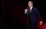 Jerry Seinfeld performing at the Menora Mivtachim Arena in Tel Aviv, Dec. 19, 2015. (Guy Prives/Redferns/Getty Images via JTA)