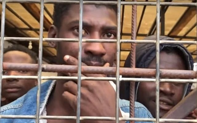African migrants being sold as slaves. (CNN screenshot) African migrants being sold as slaves. (CNN screenshot)