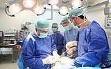 Dr. Daniel Levin performs innovative hip replacement surgery at Haifa's Rambam hospital on December 10, 2017. (Piotr Felter)