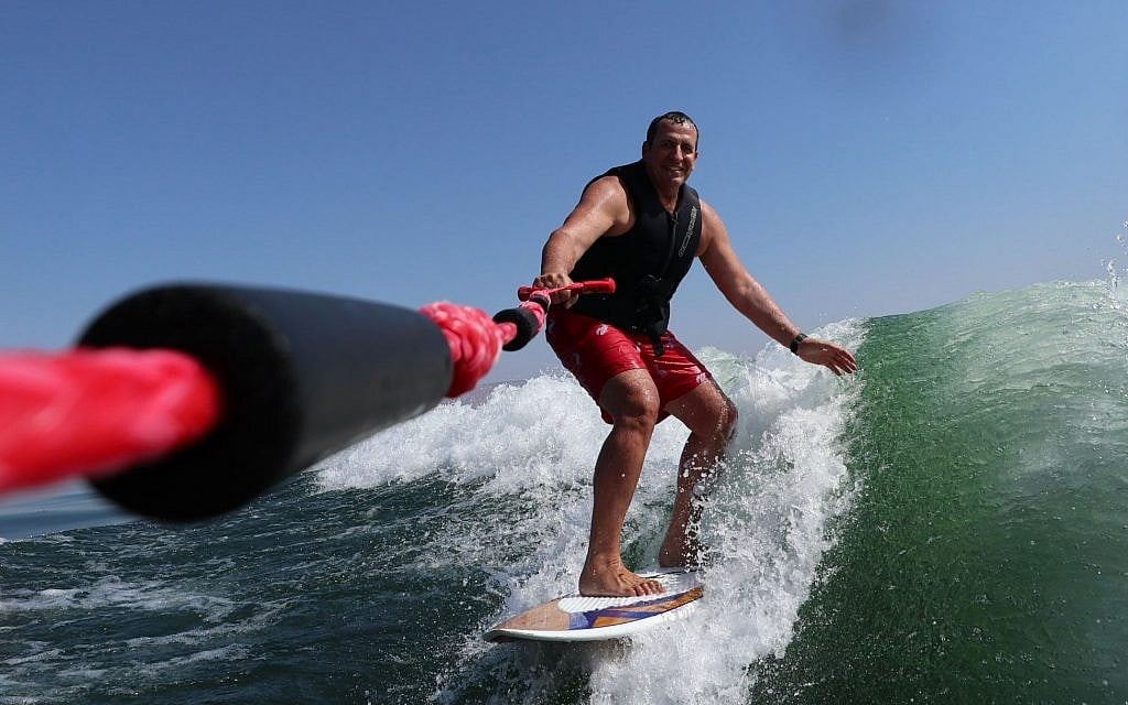 Mellanox CEO Eyal Waldman, wakesurfing on the Sea of Galilee, September 2017 (Courtesy).
