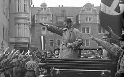 In Weimar, Germany, Adolf Hitler participates in a Nazi party rally, 1930 (public domain)