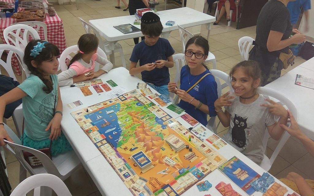 Kids play 'Jewish Luck,' the first Russian-language Jewish board game, created by Konstantin Zinkoff. (Courtesy) Kids play 'Jewish Luck,' the first Russian-language Jewish board game, created by Konstantin Zinkoff. (Courtesy)