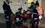 Medics treating a patient on December 31, 2017. (Courtesy/Yissachar Weiss)