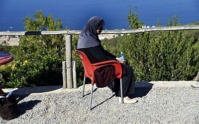Linda, an Algerian mother of three who was abandoned by her husband after being diagnosed with breast cancer, in Algiers on November 15, 2017. (RYAD KRAMDI/AFP)