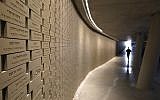 A picture taken on December 18, 2017 shows Israelis visiting the National Memorial Hall for Israel's Fallen next to the Mount Herzl military cemetery in Jerusalem, which contains the names of every man and woman who died during their military or security service since 1860. (AFP Photo/Menahem Kahana)