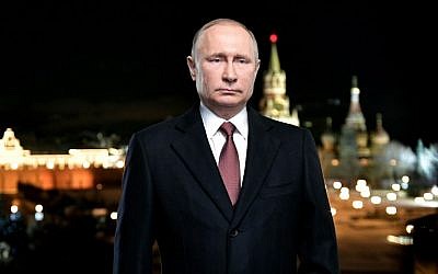 Russian President Vladimir Putin attends his New Year address to Russians in central Moscow on December 31, 2017. (Alexey NIKOLSKY/AFP)