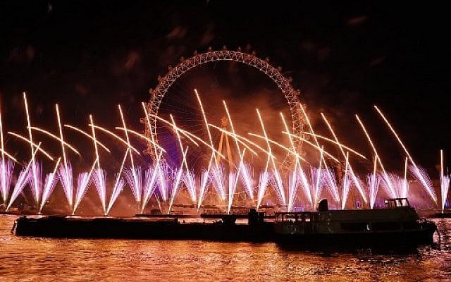 Fireworks explode around the London Eye during New Year's celebrations in central London just after midnight on January 1, 2018. (AFP PHOTO / Tolga AKMEN) Fireworks explode around the London Eye during New Year's celebrations in central London just after midnight on January 1, 2018. (AFP PHOTO / Tolga AKMEN)