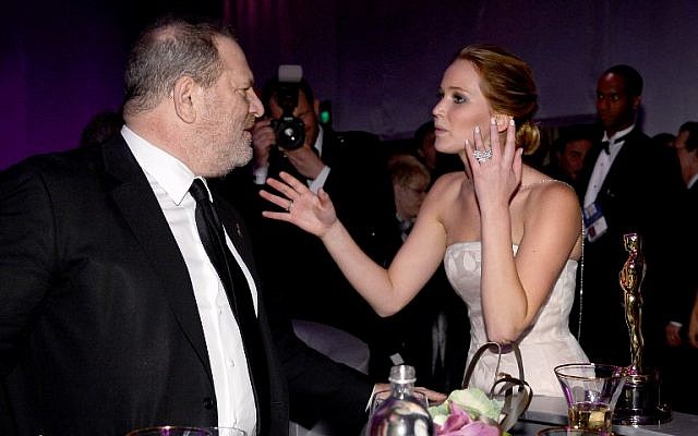 This file photo taken on February 24, 2013 shows actress Jennifer Lawrence, winner of the award for Best Actress for her performance in 'Silver Linings Playbook ' talking to producer Harvey Weinstein as she attends the Oscars Governors Ball at Hollywood & Highland Center in Hollywood, California.
(AFP PHOTO / GETTY IMAGES NORTH AMERICA / KEVORK DJANSEZIAN) This file photo taken on February 24, 2013 shows actress Jennifer Lawrence, winner of the award for Best Actress for her performance in 'Silver Linings Playbook ' talking to producer Harvey Weinstein as she attends the Oscars Governors Ball at Hollywood & Highland Center in Hollywood, California.
(AFP PHOTO / GETTY IMAGES NORTH AMERICA / KEVORK DJANSEZIAN)