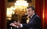 French President Emmanuel Macron delivers New Year wishes to the press at the Elysee Palace in Paris, on January 3, 2018.(AFP PHOTO / POOL / LUDOVIC MARIN)
