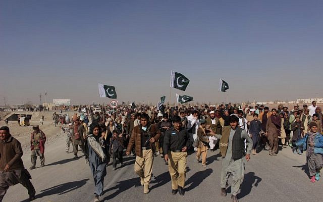 Illustrative: Pakistani demonstrators gathering during a protest against US aid cuts at the Pakistan-Afghanistan border post, in Chaman, on January 5, 2018. (AFP PHOTO / ASGHAR ACHACKZAI) Illustrative: Pakistani demonstrators gathering during a protest against US aid cuts at the Pakistan-Afghanistan border post, in Chaman, on January 5, 2018. (AFP PHOTO / ASGHAR ACHACKZAI)