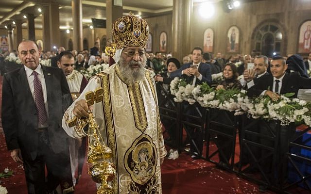 Egypt Coptic Pope Tawadros II leads the Christmas Eve mass at the Nativity of Christ Cathedral in Egypt's new administrative capital, 45km east of Cairo, on January 6, 2018. (AFP PHOTO / KHALED DESOUKI) Egypt Coptic Pope Tawadros II leads the Christmas Eve mass at the Nativity of Christ Cathedral in Egypt's new administrative capital, 45km east of Cairo, on January 6, 2018. (AFP PHOTO / KHALED DESOUKI)