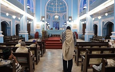 Members of the Indian Jewish community attend a morning prayer service at the Magen David Synagogue in Mumbai, January 9, 2018. (AFP Photo/Indranil Mukherjee)