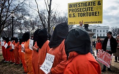 Activists protest the Guantanamo Bay detention camp during a rally in Lafayette Square outside the White House January 11, 2018 in Washington, DC. (AFP/Brendan Smialowski)