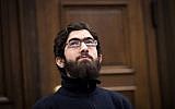 Ahmad Alhaw, a 26-year-old Palestinian man, waits in a courtroom on January 12, 2018 in Hamburg. (AFP PHOTO / POOL / Christian Charisius)
