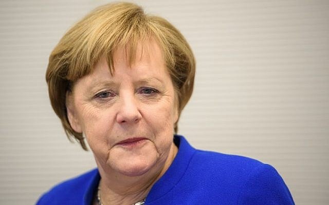 German Chancellor Angela Merkel arrives for a parliamentary group meeting at the Reichstag building in Berlin. (AFP Photo/dpa/Gregor Fischer) German Chancellor Angela Merkel arrives for a parliamentary group meeting at the Reichstag building in Berlin. (AFP Photo/dpa/Gregor Fischer)