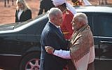 The Indian Prime Minister Narendra Modi (R) welcomes the Prime Minister of Israel Benjamin Netanyahu (C) and his wife Sara Netanyahu (L back) during a ceremonial reception at the presidential palace in New Delhi on January 15, 2018.(AFP PHOTO / Prakash SINGH)