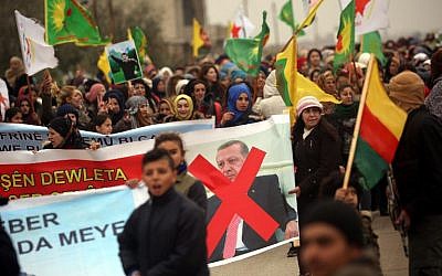 Syrian Kurds march during a protest in support of Afrin on January 18, 2018, in the northern Syrian town of Jawadiyah. (AFP Photo/Delil Souleiman)