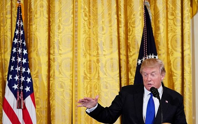 US President Donald Trump speaks during a working session with mayors in the East Room of the White House on January 24, 2018 in Washington, DC. (AFP/MANDEL NGAN) US President Donald Trump speaks during a working session with mayors in the East Room of the White House on January 24, 2018 in Washington, DC. (AFP/MANDEL NGAN)