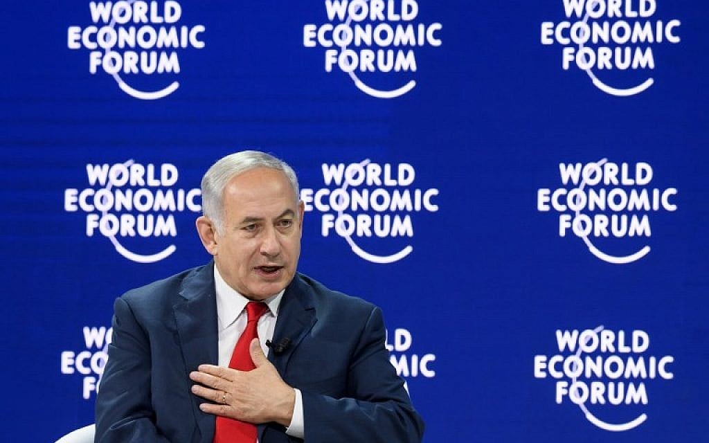 Prime Minister Benjamin Netanyahu at the World Economic Forum (WEF) annual meeting on January 25, 2018, in Davos, Switzerland. (AFP Photo/Fabrice Coffrini) Prime Minister Benjamin Netanyahu at the World Economic Forum (WEF) annual meeting on January 25, 2018, in Davos, Switzerland. (AFP Photo/Fabrice Coffrini)