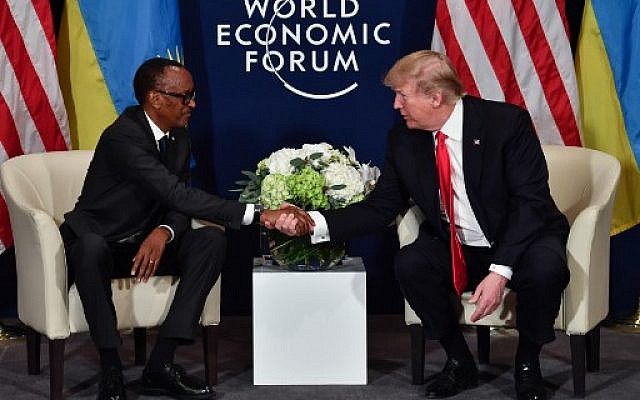 US President Donald Trump (R) shakes hands with Rwandan President President Paul Kagame during a bilateral meeting on the sideline of the annual meeting of the World Economic Forum (WEF) on January 26, 2018 in Davos, eastern Switzerland. ( AFP PHOTO / Nicholas Kamm) US President Donald Trump (R) shakes hands with Rwandan President President Paul Kagame during a bilateral meeting on the sideline of the annual meeting of the World Economic Forum (WEF) on January 26, 2018 in Davos, eastern Switzerland. ( AFP PHOTO / Nicholas Kamm)