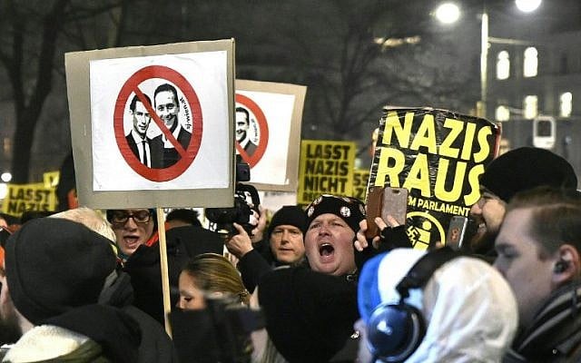 People hold up placards during a protest against Austria's far-right Freedom Paty in Vienna on January 26, 2018. (AFP Photo/APA/Hans Punz) People hold up placards during a protest against Austria's far-right Freedom Paty in Vienna on January 26, 2018. (AFP Photo/APA/Hans Punz)