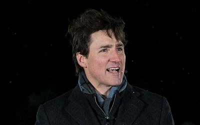 Canadian Prime Minister Justin Trudeau speaks at a rally in memory of the victims of the Islamic Cultural Center shooting, in Quebec City, Canada, on January 29, 2018. (AFP Photo/Alice Chiche)