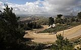 The border fence between Israel and Lebanon with the southern Lebanese village of Blida in the background, from the Israeli kibbutz of Yiftah, on January 30, 2018. (AFP Photo/Jalaa Marey)