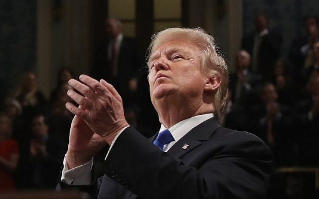 US President Donald Trump claps during the State of the Union address in the chamber of the US House of Representatives in Washington, DC, on January 30, 2018. (AFP PHOTO / POOL / Win McNamee) US President Donald Trump claps during the State of the Union address in the chamber of the US House of Representatives in Washington, DC, on January 30, 2018. (AFP PHOTO / POOL / Win McNamee)