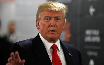 US President Donald Trump is seen ahead of the College Football Championship game between the Alabama Crimson Tide and the Georgia Bulldogs at Mercedes-Benz Stadium in Atlanta, Georgia on January 8, 2018. (Mike Lawrie/Getty Images/AFP)