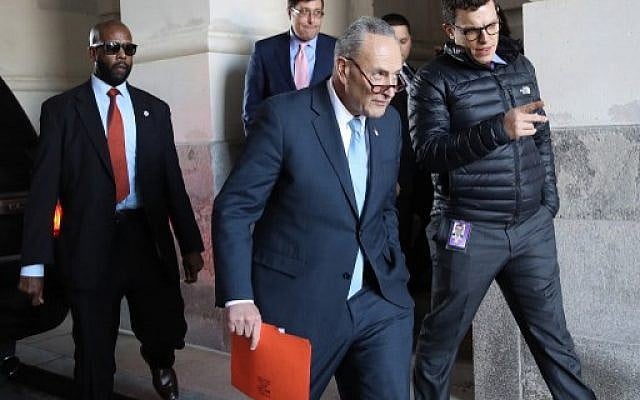 Senate Minority Leader Chuck Schumer (D-NY) returns to the US Capitol after meeting with US President Donald Trump on the looming threat of a federal government shutdown January 19, 2018 in Washington, DC. (Win McNamee/Getty Images/AFP) Senate Minority Leader Chuck Schumer (D-NY) returns to the US Capitol after meeting with US President Donald Trump on the looming threat of a federal government shutdown January 19, 2018 in Washington, DC. (Win McNamee/Getty Images/AFP)