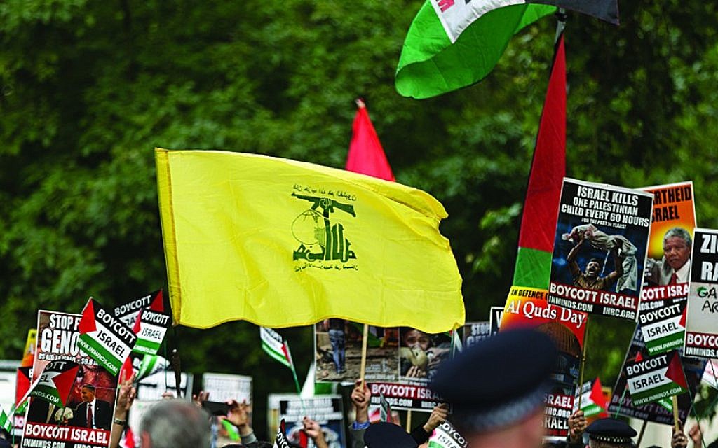 UK police charged Jewish man with racial harassment after holding anti-Hezbollah sign