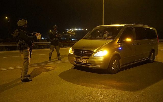 Illustrative: Israeli soldiers set up a security checkpoint in the northern West Bank after a terror attack on January 9, 2018. (Israel Defense Forces) Illustrative: Israeli soldiers set up a security checkpoint in the northern West Bank after a terror attack on January 9, 2018. (Israel Defense Forces)