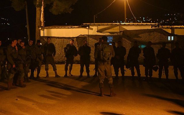Soldiers prepare for deployment after a lethal terror attack in the northern West Bank on January 10, 2018. (Israel Defense Forces) Soldiers prepare for deployment after a lethal terror attack in the northern West Bank on January 10, 2018. (Israel Defense Forces)