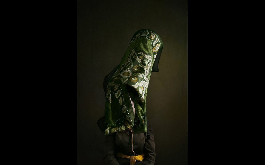 'Even five years ago it was all brown and black, like the regime wants. But now colors, colors, colors! So every day I wear my bright colored hijab and get on my bike (which is against the law now) to defy the regime.' (© Marinka Masséus)