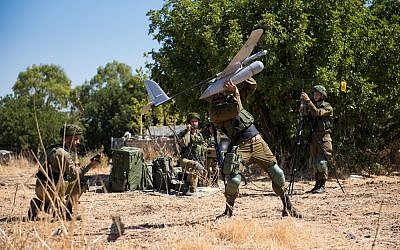 Soldiers from the IDF's Sky Riders Unit launch a Skylark drone during an exercise in an undated photograph. (Israel Defense Forces)