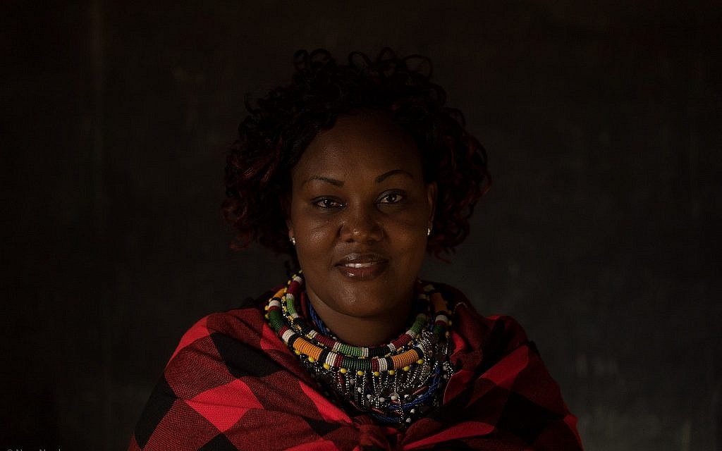 Portrait of a Nashulai Conservancy scout and member of the Maasai community. (Nora Nord)