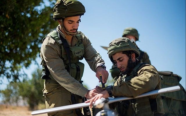 Soldiers from the IDF's Sky Riders Unit work on a Skylark drone during an exercise in an undated photograph. (Israel Defense Forces) Soldiers from the IDF's Sky Riders Unit work on a Skylark drone during an exercise in an undated photograph. (Israel Defense Forces)