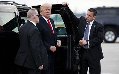 US President Donald Trump arrives to board Air Force One at Palm Beach International Airport on Jan. 1, 2018, in West Palm Beach, Florida. (AP Photo/Evan Vucci)