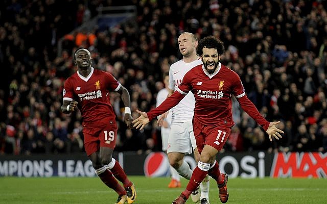 In this December 6, 2017 photo, Liverpool's Mohamed Salah, right, celebrates after scoring his side's seventh goal during the Champions League Group E soccer match in Liverpool, England. (AP Photo/Rui Vieira) In this December 6, 2017 photo, Liverpool's Mohamed Salah, right, celebrates after scoring his side's seventh goal during the Champions League Group E soccer match in Liverpool, England. (AP Photo/Rui Vieira)