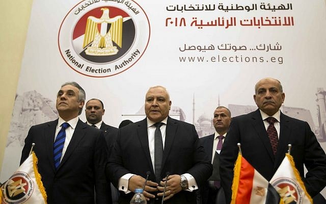 Lasheen Ibrahim, head of the National Electoral Commission, which is in charge of supervising the 2018 Egyptian presidential election, center, and members of the commission prepare to give a press conference at the commission headquarters in Cairo, Egypt, January 8, 2018. (AP Photo/Amr Nabil) Lasheen Ibrahim, head of the National Electoral Commission, which is in charge of supervising the 2018 Egyptian presidential election, center, and members of the commission prepare to give a press conference at the commission headquarters in Cairo, Egypt, January 8, 2018. (AP Photo/Amr Nabil)