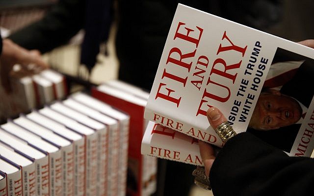 A customer looks at a copy of Michael Wolff's "Fire and Fury: Inside the Trump White House" as they go on sale at a bookshop, in London, Tuesday, Jan. 9, 2018. (AP Photo/Alastair Grant) A customer looks at a copy of Michael Wolff's "Fire and Fury: Inside the Trump White House" as they go on sale at a bookshop, in London, Tuesday, Jan. 9, 2018. (AP Photo/Alastair Grant)