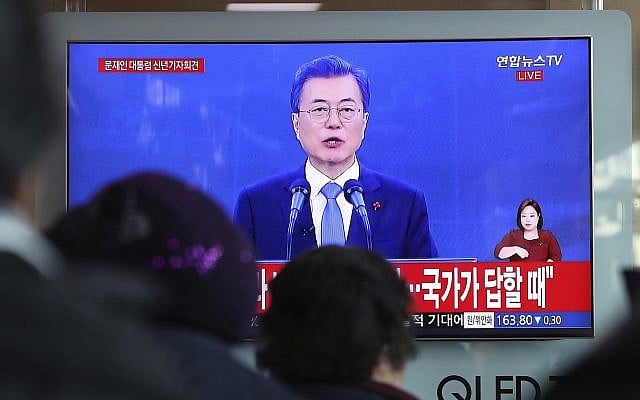 People watch a live broadcast of South Korean President Moon Jae-in's New Year's speech at the Seoul Railway Station in Seoul, South Korea, Wednesday, Jan. 10, 2018. (AP Photo/Lee Jin-man) People watch a live broadcast of South Korean President Moon Jae-in's New Year's speech at the Seoul Railway Station in Seoul, South Korea, Wednesday, Jan. 10, 2018. (AP Photo/Lee Jin-man)