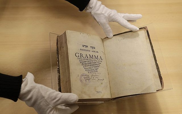 The book titled 'Mikne Avram - Peculium Abrae' is displayed at the Prague's Jewish Museum in Prague, Czech Republic, January 16, 2018. (AP Photo/Petr David Josek)