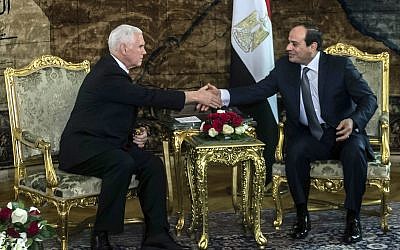 US Vice President Mike Pence shakes hands with Egyptian President Abdel-Fattah el-Sissi, right, at the Presidential Palace in Cairo, Egypt, Saturday, Jan. 20, 2018. (Khaled Desouki/Pool Photo via AP)