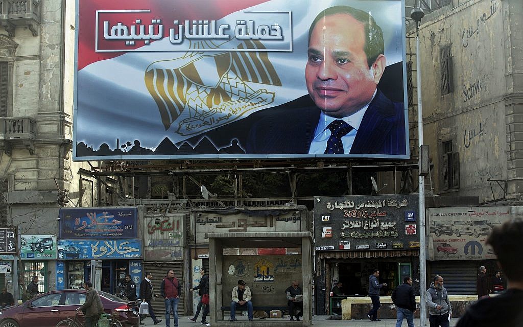 A billboard supporting Egyptian President Abdel-Fattah el-Sissi in the presidential election scheduled for March hangs in downtown Cairo, Egypt, on January 22, 2018. (AP Photo/Amr Nabil)