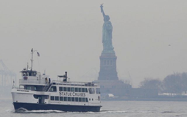 A Statue of Liberty and Ellis Island tour boat passes by the Statue of Liberty after dropping passengers off there on January 22, 2018, in New York. (AP Photo/Kathy Willens) A Statue of Liberty and Ellis Island tour boat passes by the Statue of Liberty after dropping passengers off there on January 22, 2018, in New York. (AP Photo/Kathy Willens)