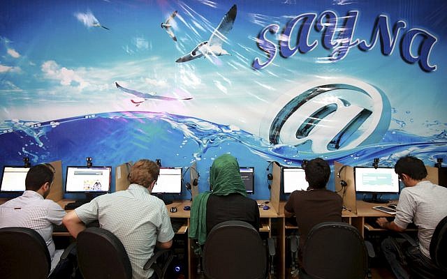 In this file photo from September 17, 2013, Iranians surf the Internet at a cafe in Tehran, Iran. (AP Photo/Ebrahim Noroozi, File) In this file photo from September 17, 2013, Iranians surf the Internet at a cafe in Tehran, Iran. (AP Photo/Ebrahim Noroozi, File)