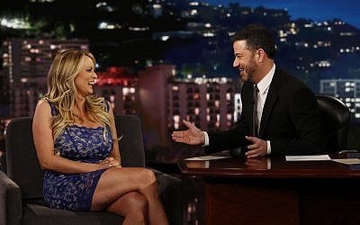 Adult film star Stormy Daniels, left, with host Jimmy Kimmel during an appearance on 'Jimmy Kimmel Live!,' January 30, 2018. (Randy Holmes/ABC via AP)
