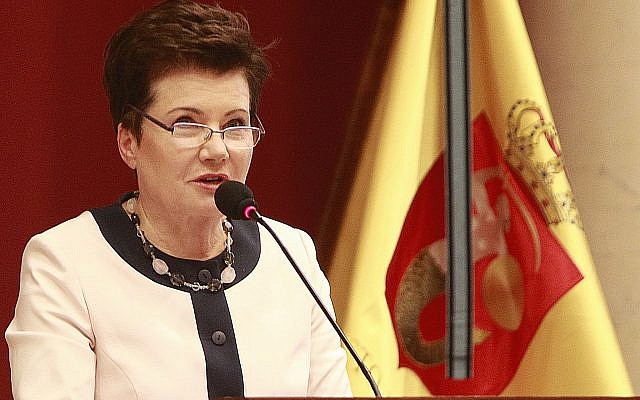 Warsaw Mayor Hanna Gronkiewicz-Waltz tells an extraordinary session of the Warsaw city council in Warsaw, Poland about irregularities in the restitution of seized Warsaw property to private owners, September 1, 2016. (Czarek Sokolowski/AP)